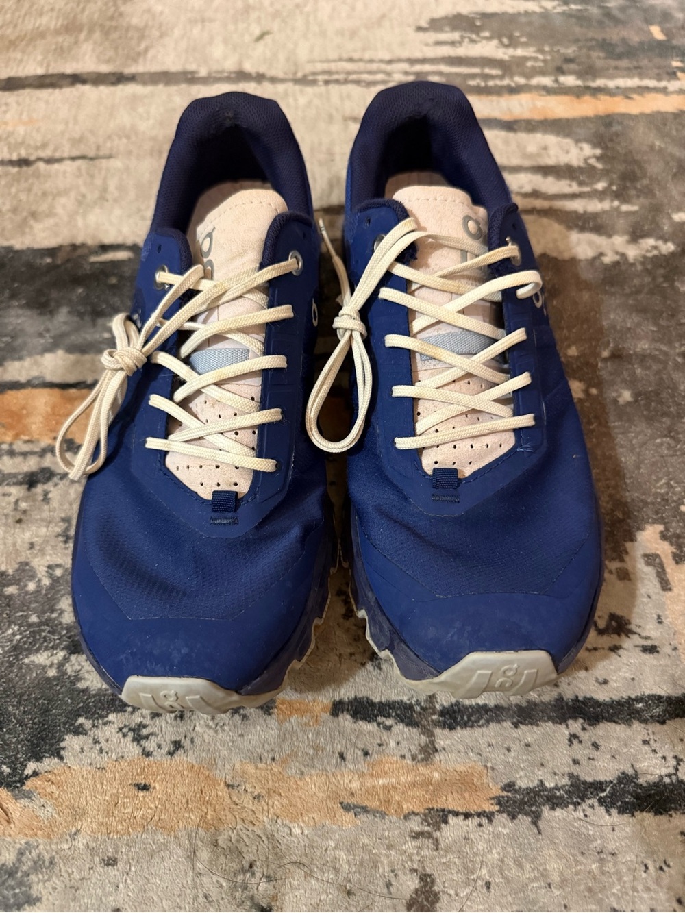 On Running Women’s Cloudrunner Athletic Shoes in Navy and Cream